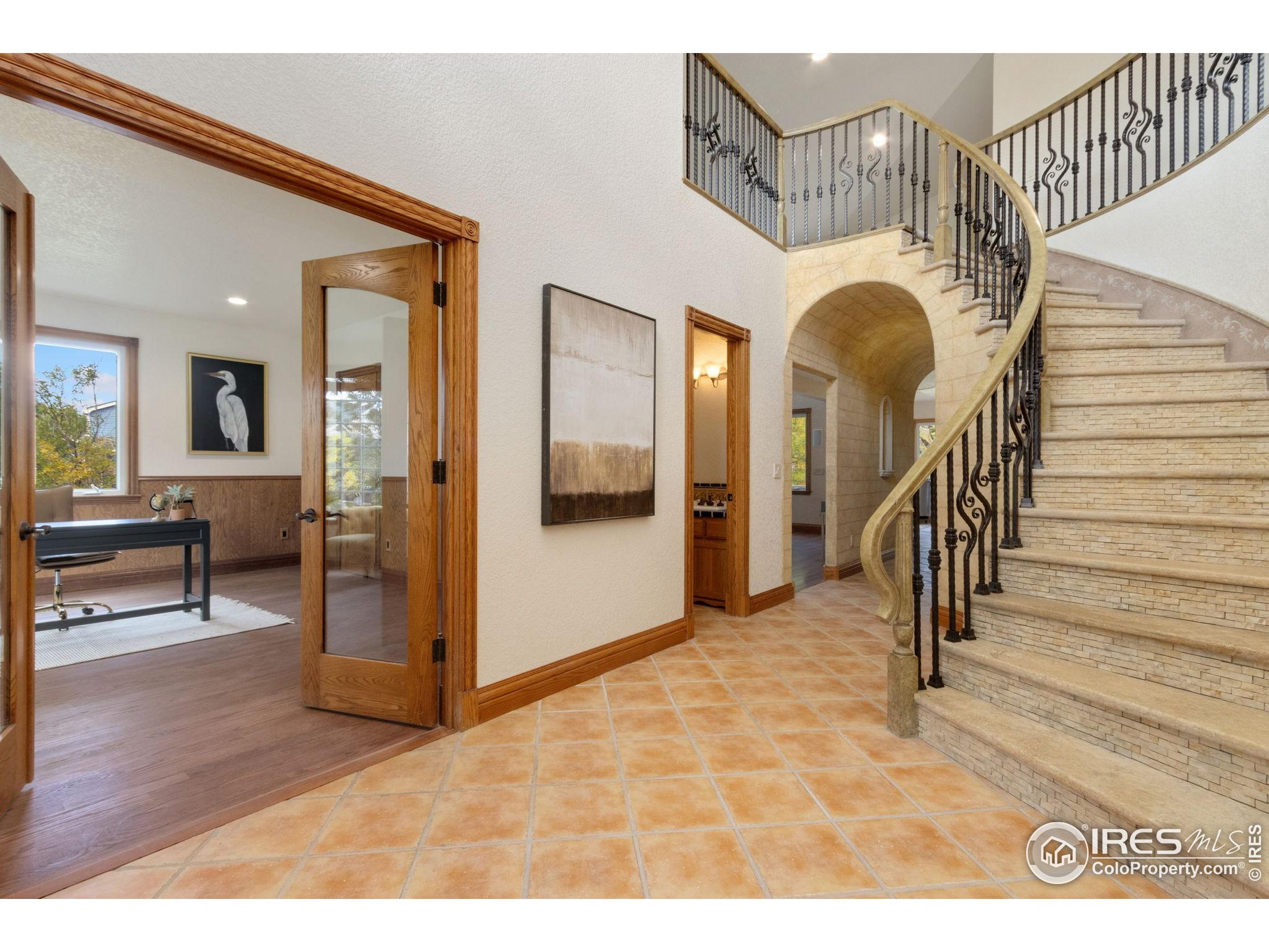 3908 Westfield Court Fort Collins, CO 80526 - Photo 4 of 45 a view of entryway and hall with wooden floor