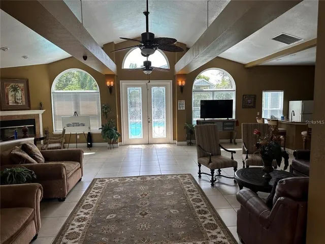 a view of a swimming pool with a patio