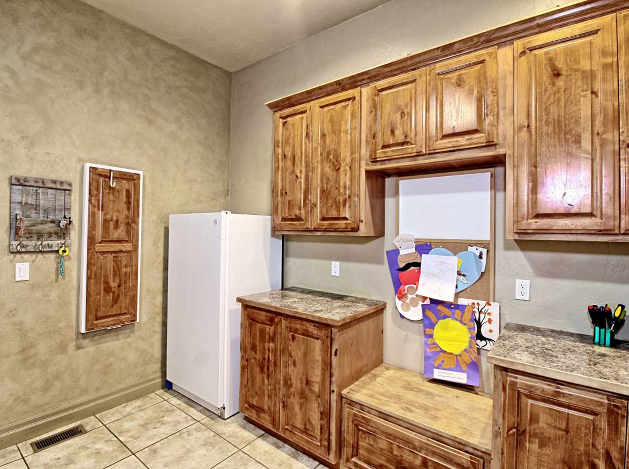 2029 K Road Fruita, CO 81521 - Photo 25 of 39 a kitchen with refrigerator and washing machine