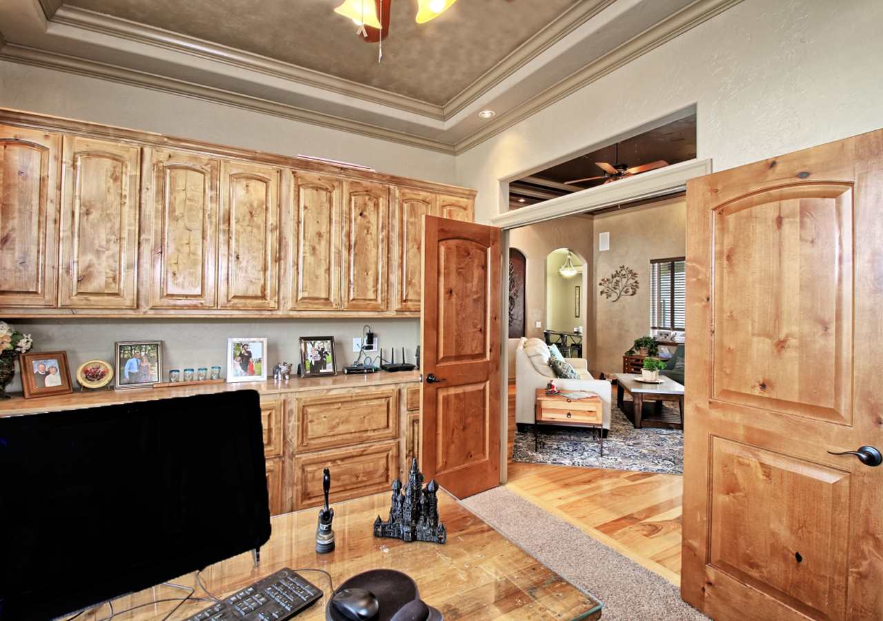 2029 K Road Fruita, CO 81521 - Photo 27 of 39 a living room with furniture window and wooden floor