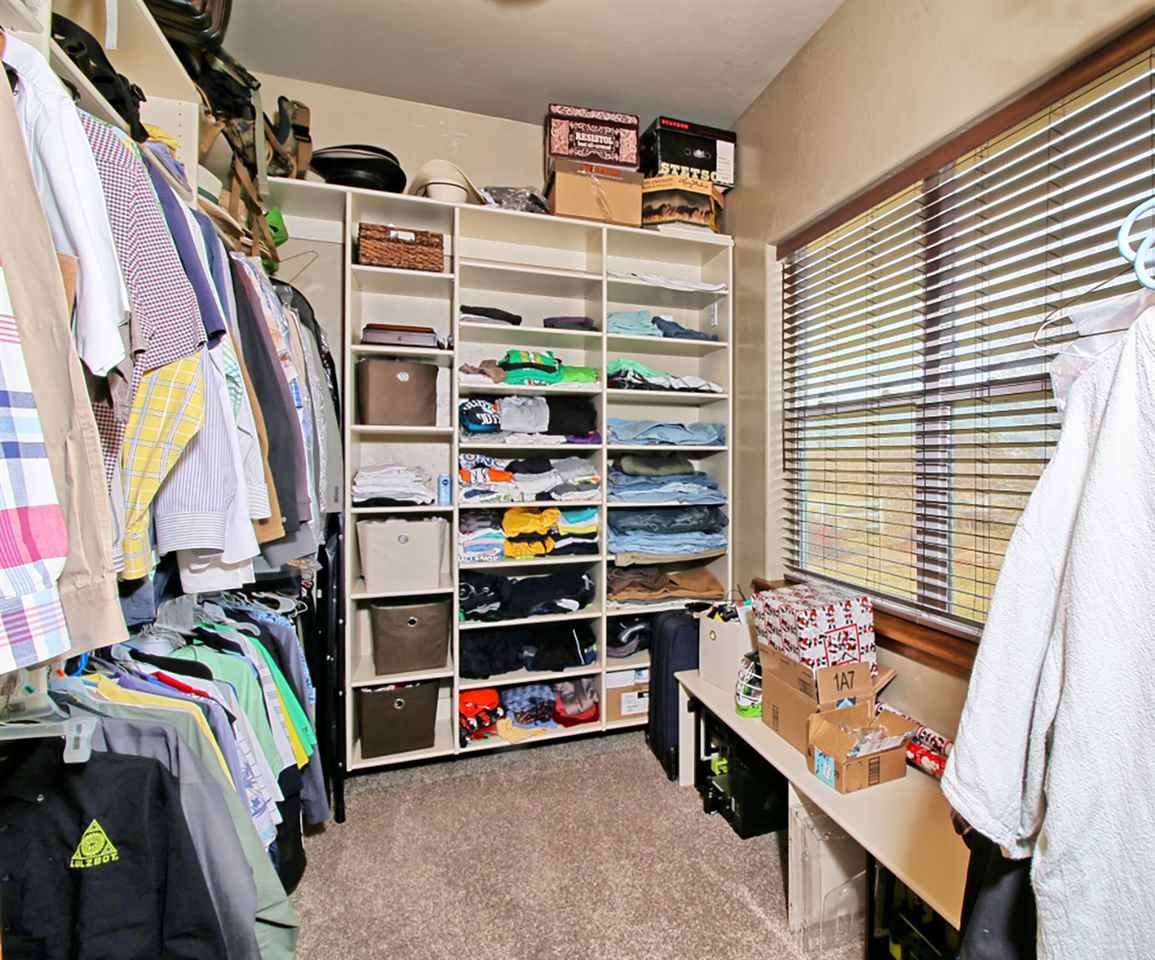 2029 K Road Fruita, CO 81521 - Photo 28 of 39 a view of walk in closet with clothes and shoes