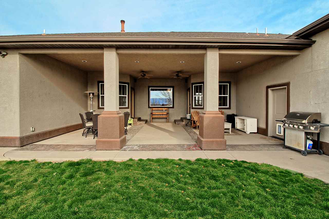 2029 K Road Fruita, CO 81521 - Photo 32 of 39 a view of a dinning room with a backyard