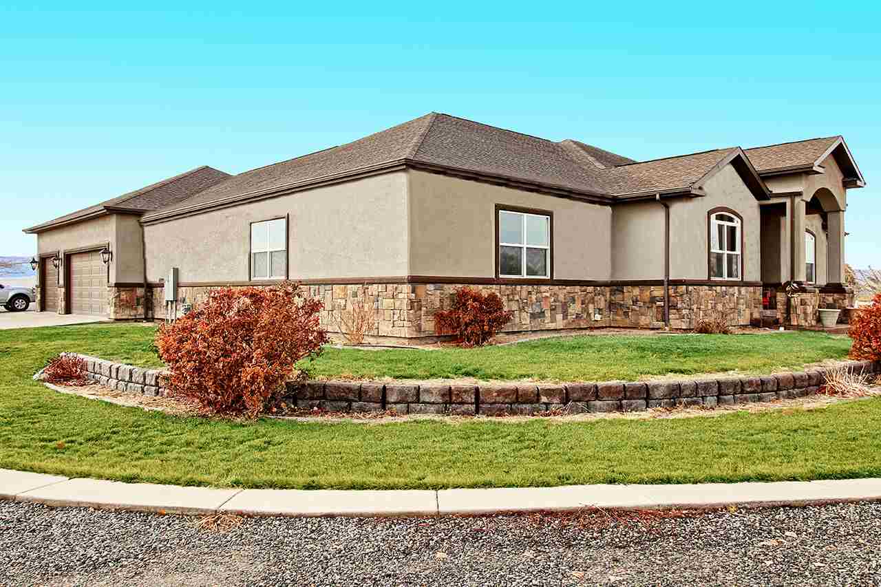2029 K Road Fruita, CO 81521 - Photo 4 of 39 a view of a house with a yard