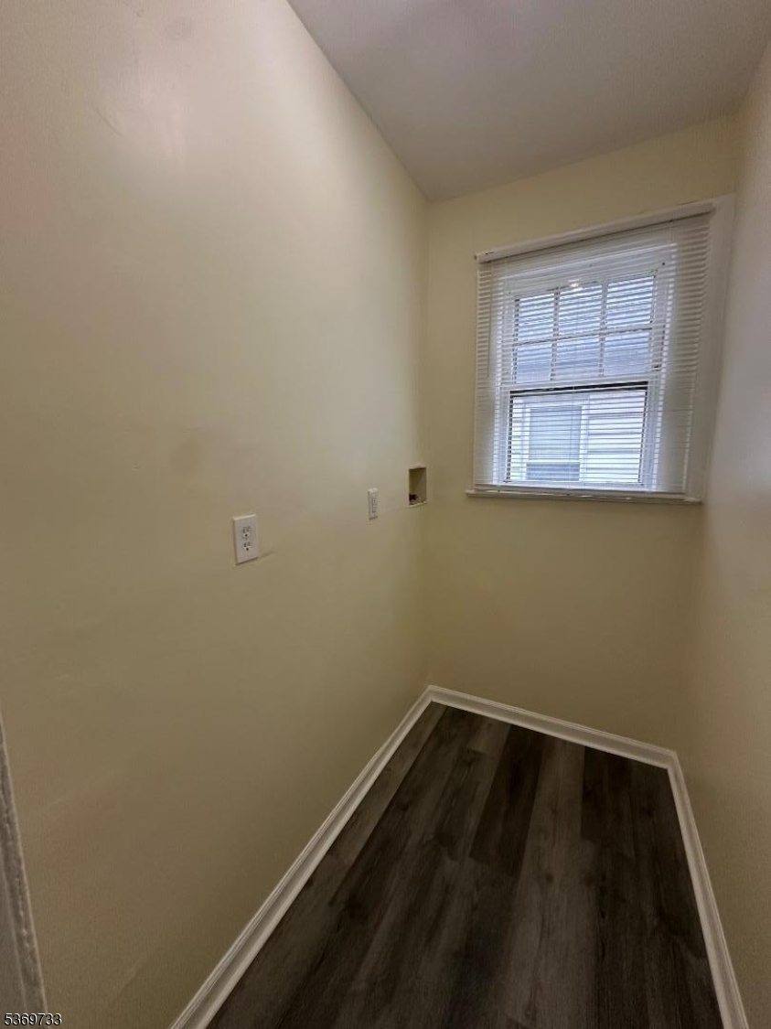 449 3rd Avenue, Unit 2 Elizabeth Port, NJ 07206 - Photo 11 of 11 a view of a small space with wooden floor and a window