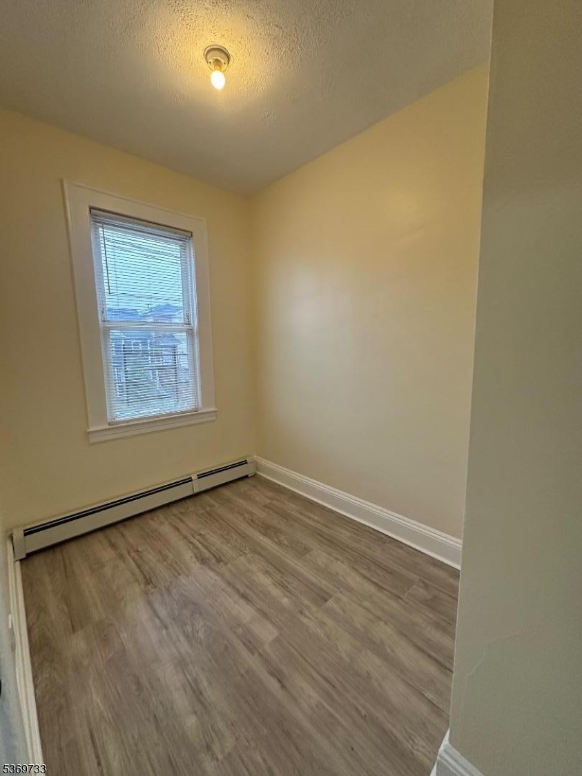 449 3rd Avenue, Unit 2 Elizabeth Port, NJ 07206 - Photo 6 of 11 a view of an empty room
