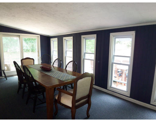 93 Concord Road Chelmsford, MA 01824 - Photo 11 of 18 a view of a dining room with furniture and window