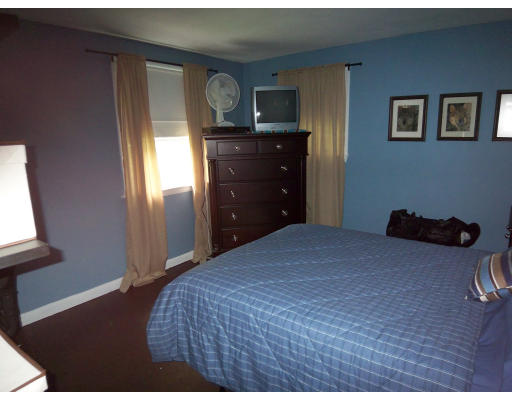 93 Concord Road Chelmsford, MA 01824 - Photo 13 of 18 a bedroom with a bed and a dresser