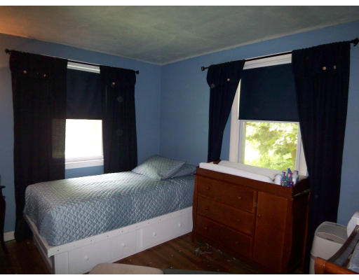 93 Concord Road Chelmsford, MA 01824 - Photo 9 of 18 a bedroom with a bed and a window