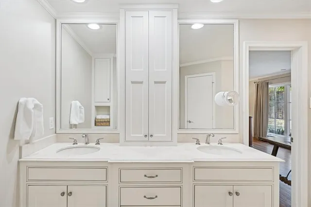 a room with a dresser and a mirror