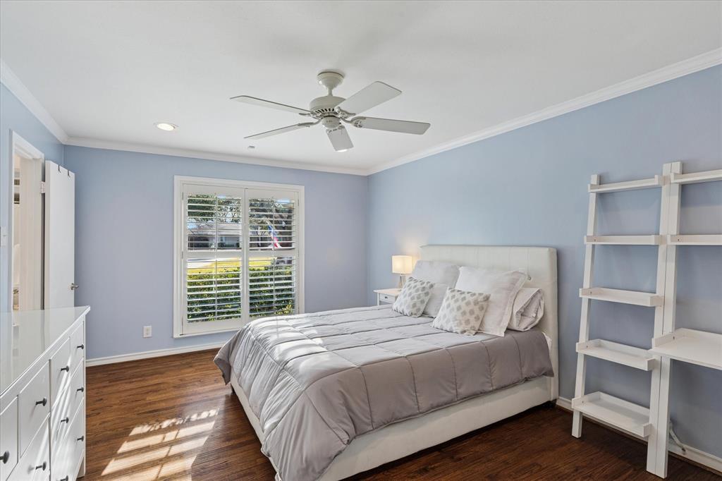 12650 Harriet Circle Dallas, TX 75244 - Photo 23 of 30 a bedroom with a large bed and a window