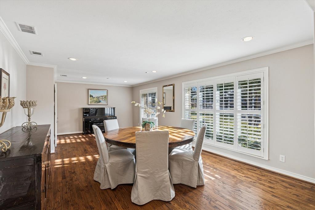 12650 Harriet Circle Dallas, TX 75244 - Photo 4 of 30 a view of a dining room with furniture window and wooden floor