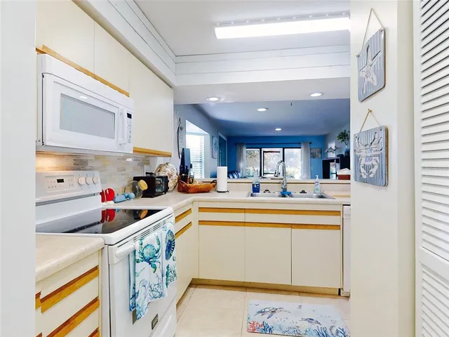 a bathroom with a bath tub with a shower