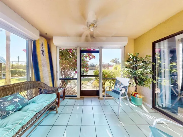 a bed room with a bed and a chandelier