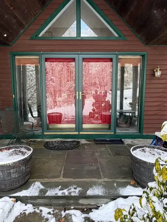 a view of a entryway door front of house