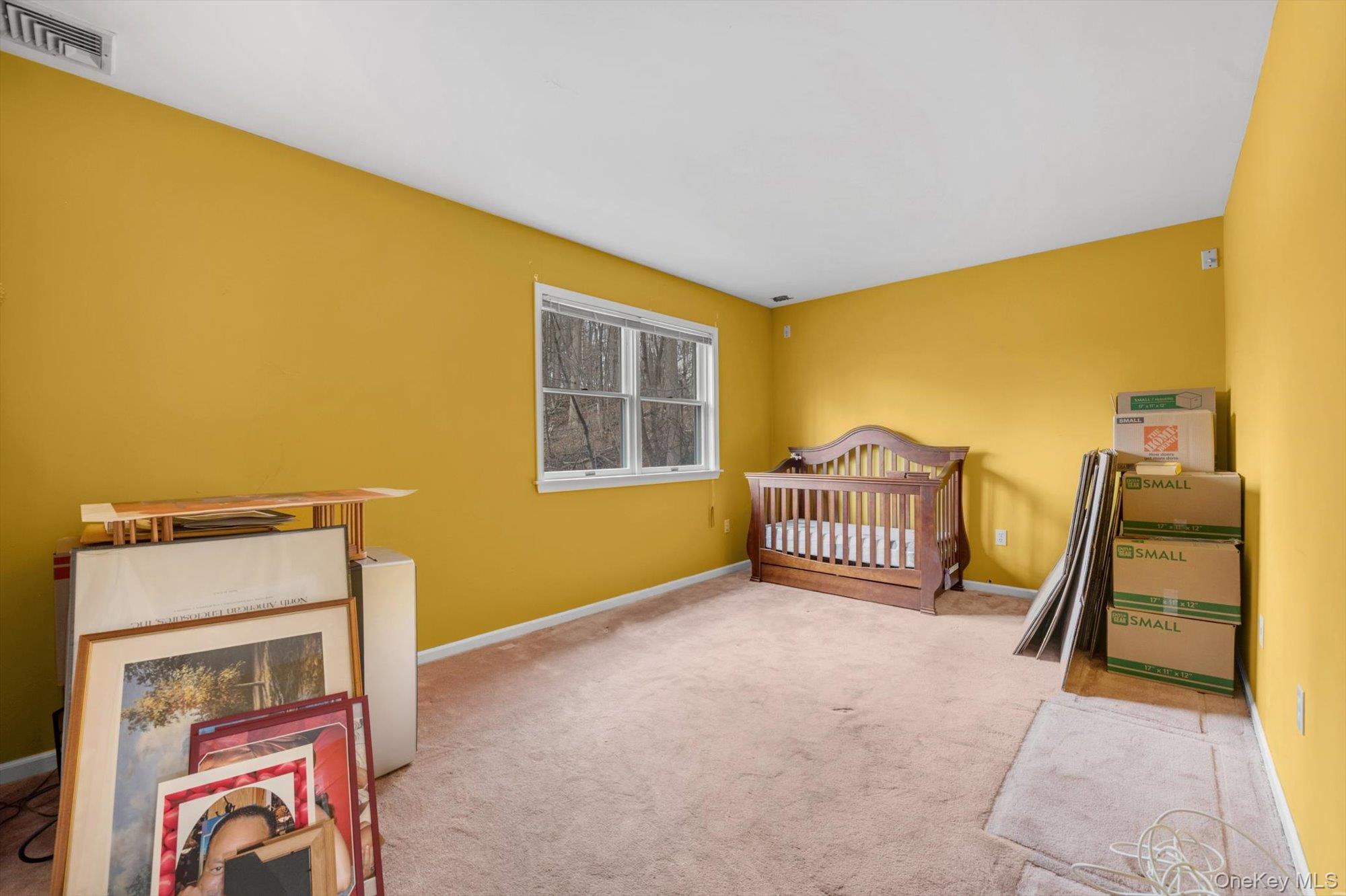 4 Greenlawn Road Cortlandt Manor, NY 10567 - Photo 12 of 26 a view of an empty room with a window