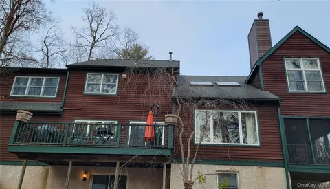 a front view of a house with balcony