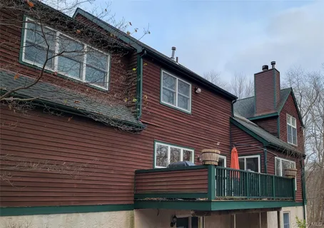 a front view of a house with a balcony