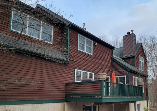 a front view of a house with a balcony