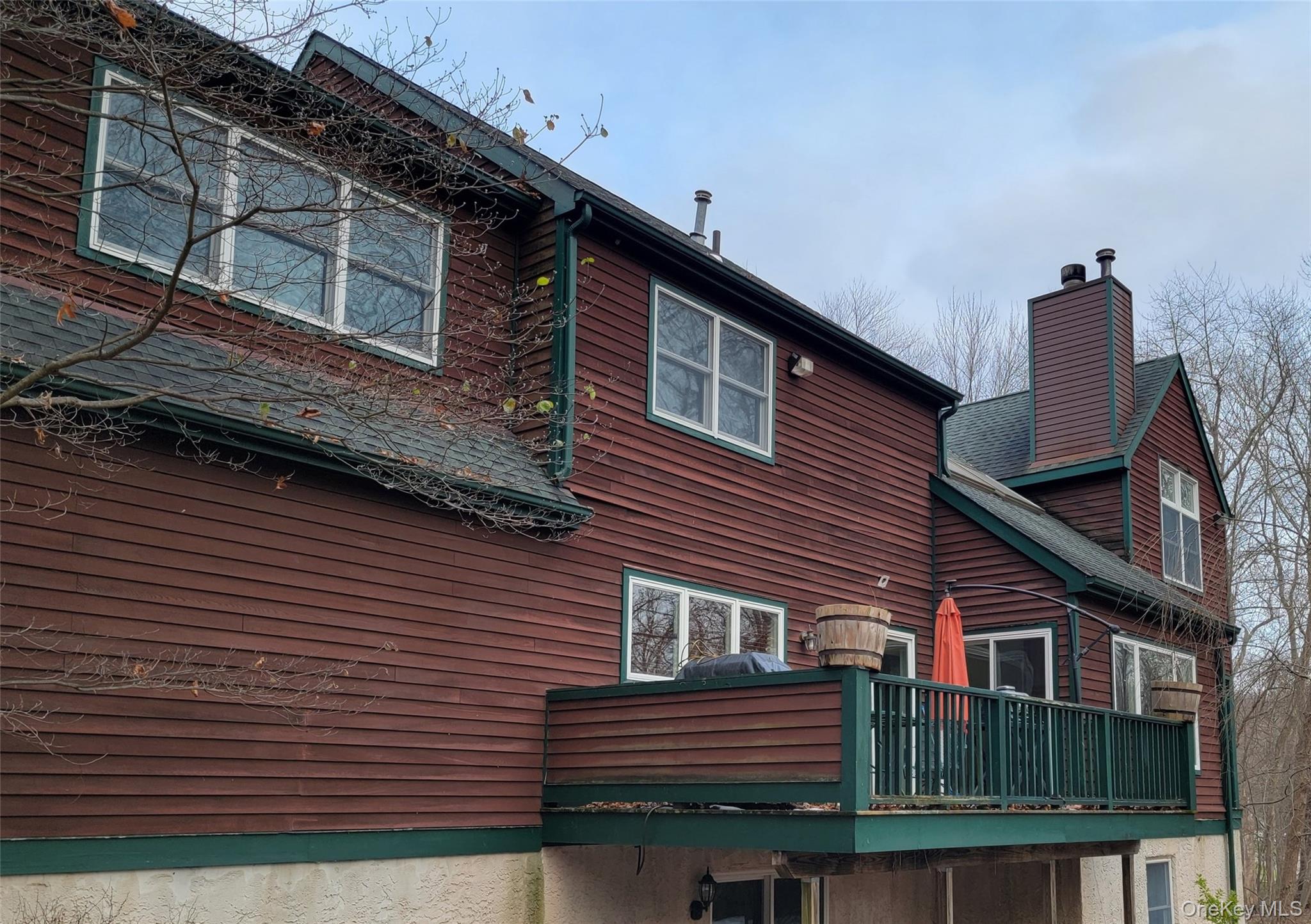 4 Greenlawn Road Cortlandt Manor, NY 10567 - Photo 20 of 24 Rear view of property with a chimney and a shingled roof