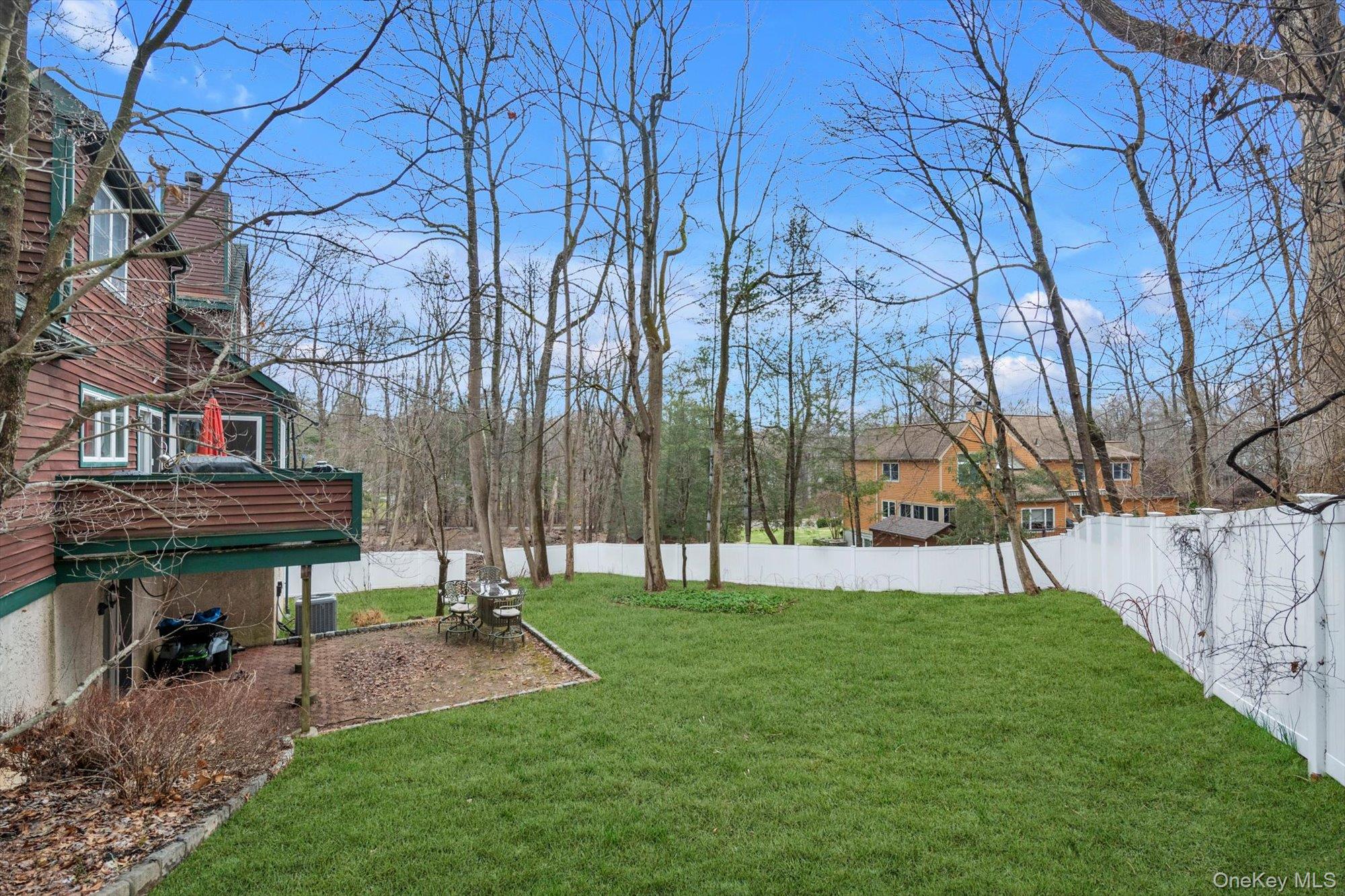 4 Greenlawn Road Cortlandt Manor, NY 10567 - Photo 22 of 26 a view of house with a backyard