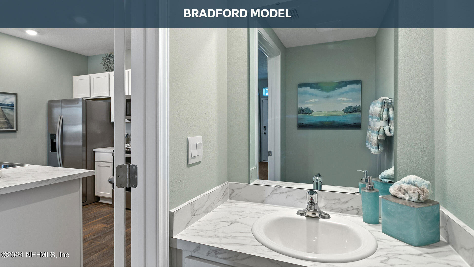 3581 Prairie Wind Court Middleburg, FL 32068 - Photo 13 of 30 a en suite bathroom with a granite countertop sink and a mirror