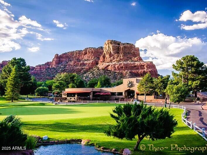 70 Courthouse Butte Road, Unit 114 Sedona, AZ 86351 - Photo 10 of 11 a view of a big building with a big yard