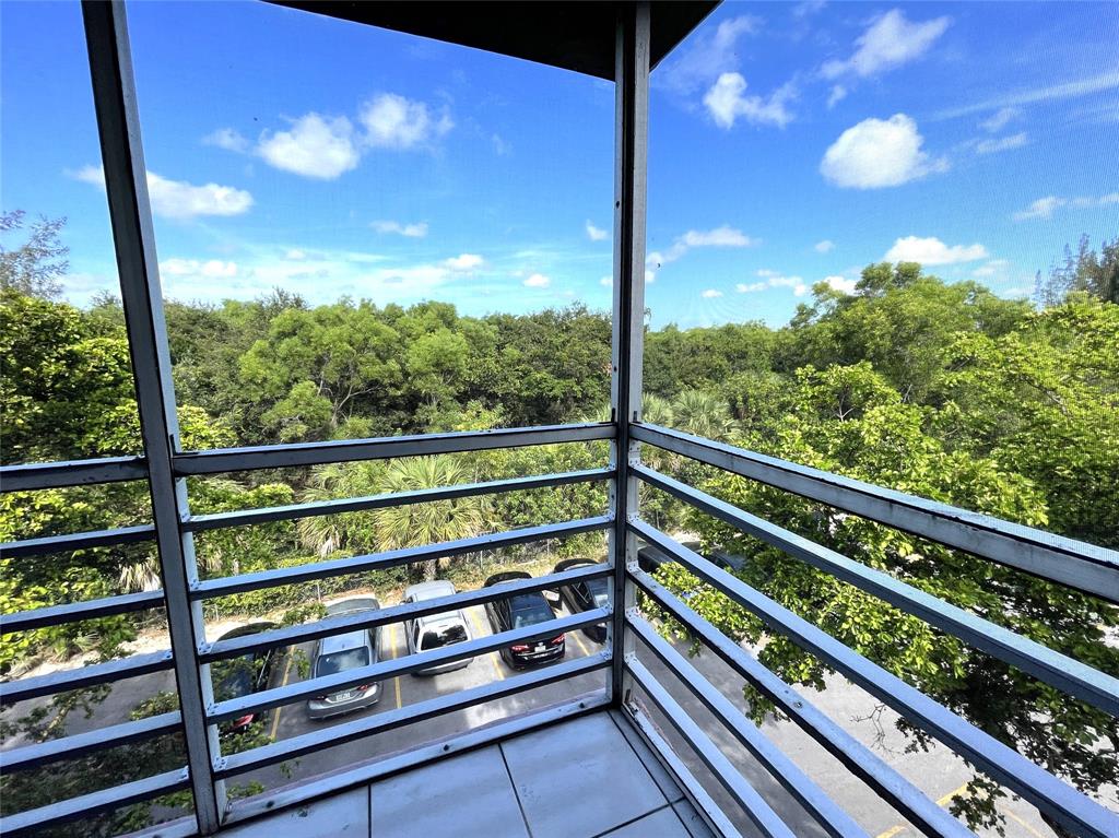 2800 Northwest 56th Avenue, Unit E407 Lauderhill, FL 33313 - Photo 11 of 15 a view of a city from a balcony