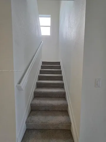 a view of a hallway with window
