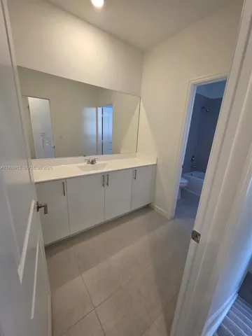 a view of a room with rack on the wall