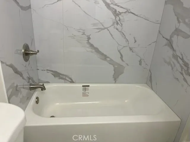 a bathroom with a bathtub