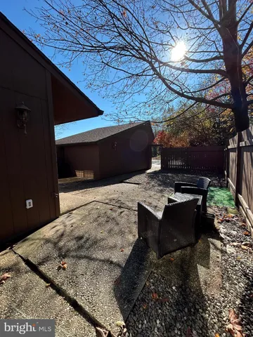 a view of a backyard of a house