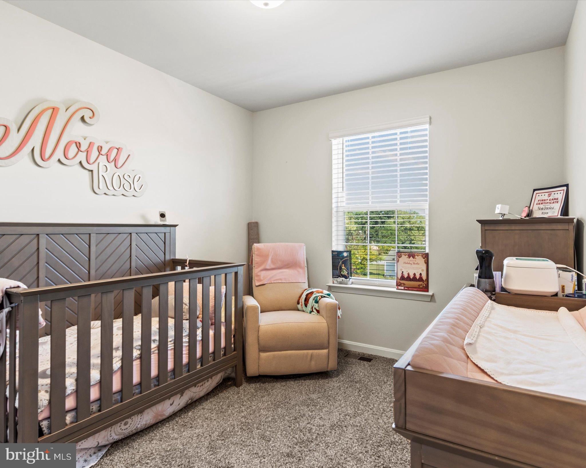 6610 Bullrush Court Clinton, MD 20735 - Photo 13 of 22 a bedroom with a bed and a couch