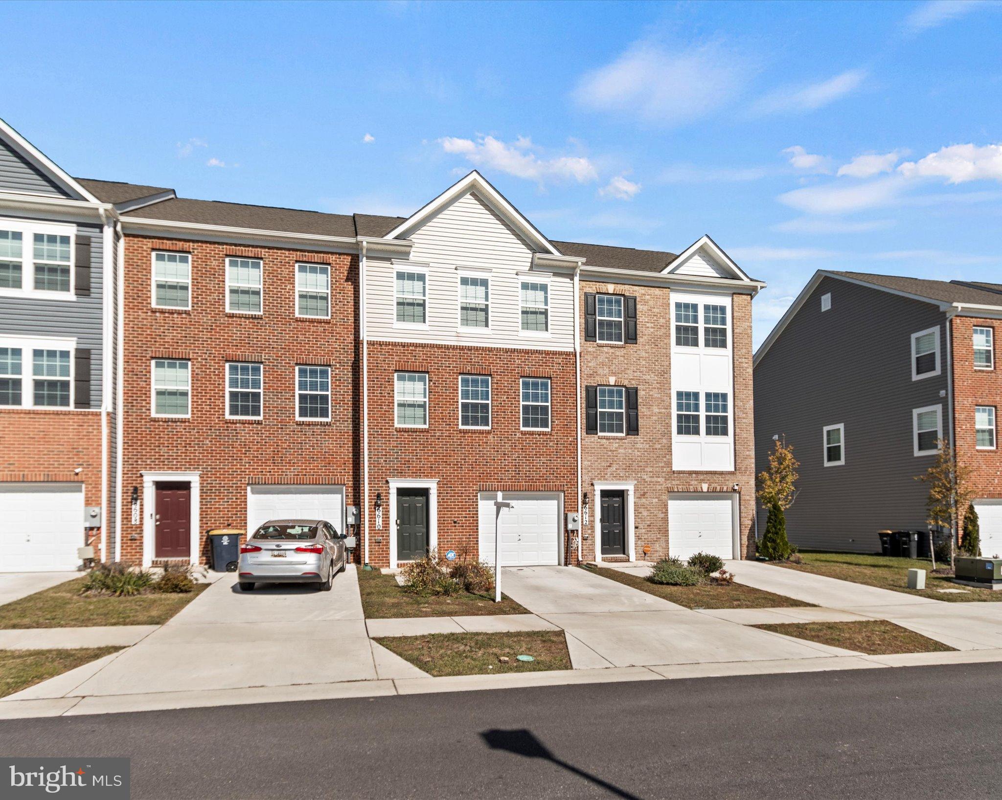6610 Bullrush Court Clinton, MD 20735 - Photo 2 of 22 a view of multiple houses with a street