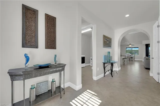 a view of living room with granite countertop furniture and fireplace