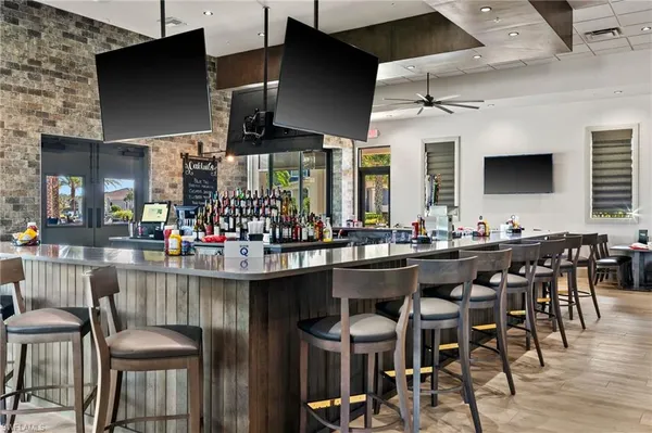 a kitchen with a table and chairs in it