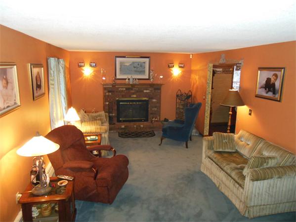 207 Hubbardston Road Templeton, MA 01468 - Photo 18 of 19 a living room with furniture and a fireplace
