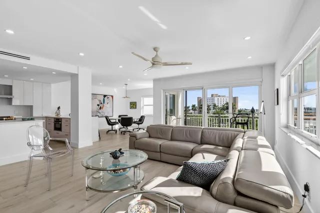 a kitchen with stainless steel appliances a sink stove and refrigerator
