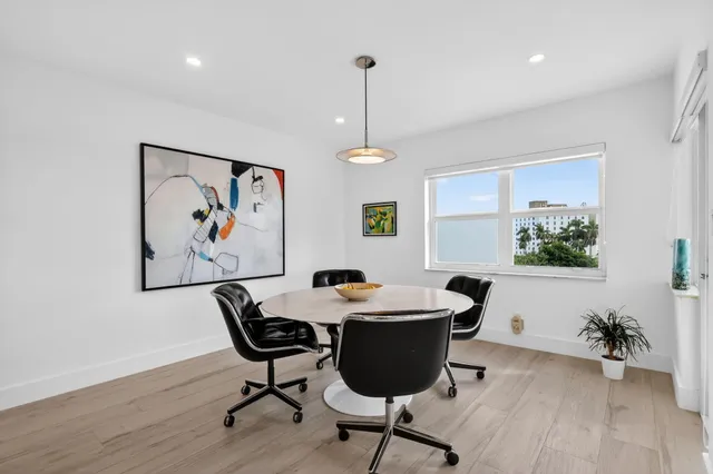 a view of a living room filled with furniture