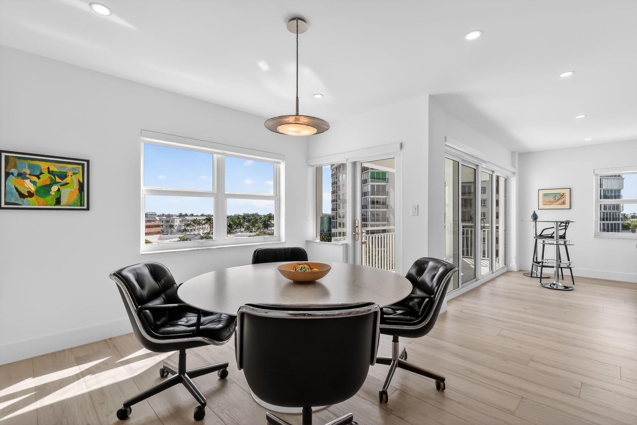 1000 Lowry Street, Unit 6J Delray Beach, FL 33483 - Photo 26 of 63 a view of a dining room with furniture window and wooden floor