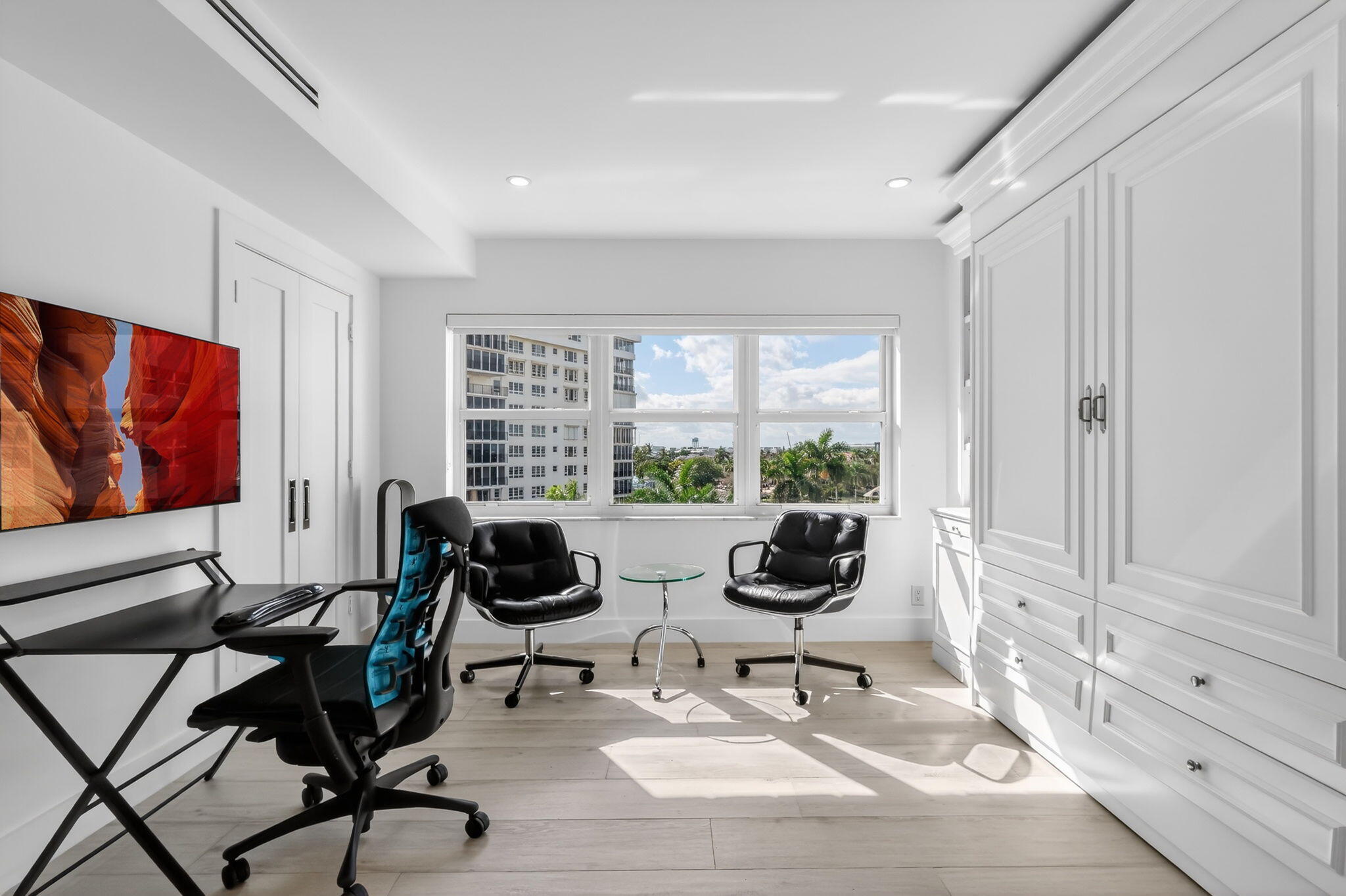 1000 Lowry Street, Unit 6J Delray Beach, FL 33483 - Photo 28 of 63 a view of a workspace with furniture and a window