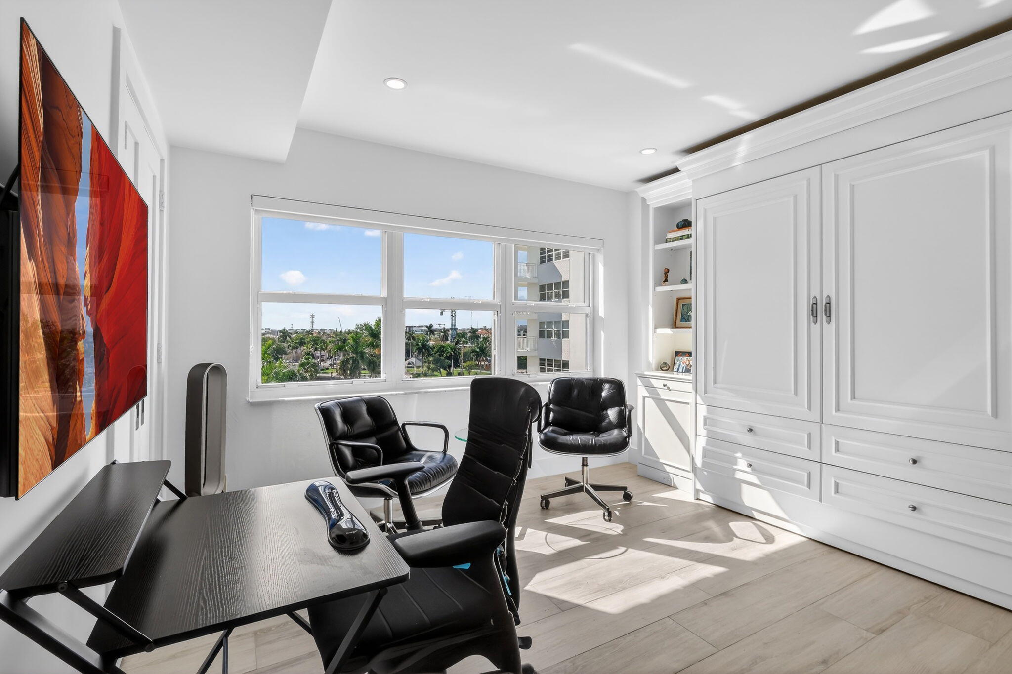 1000 Lowry Street, Unit 6J Delray Beach, FL 33483 - Photo 29 of 63 a view of a workspace with furniture and a window