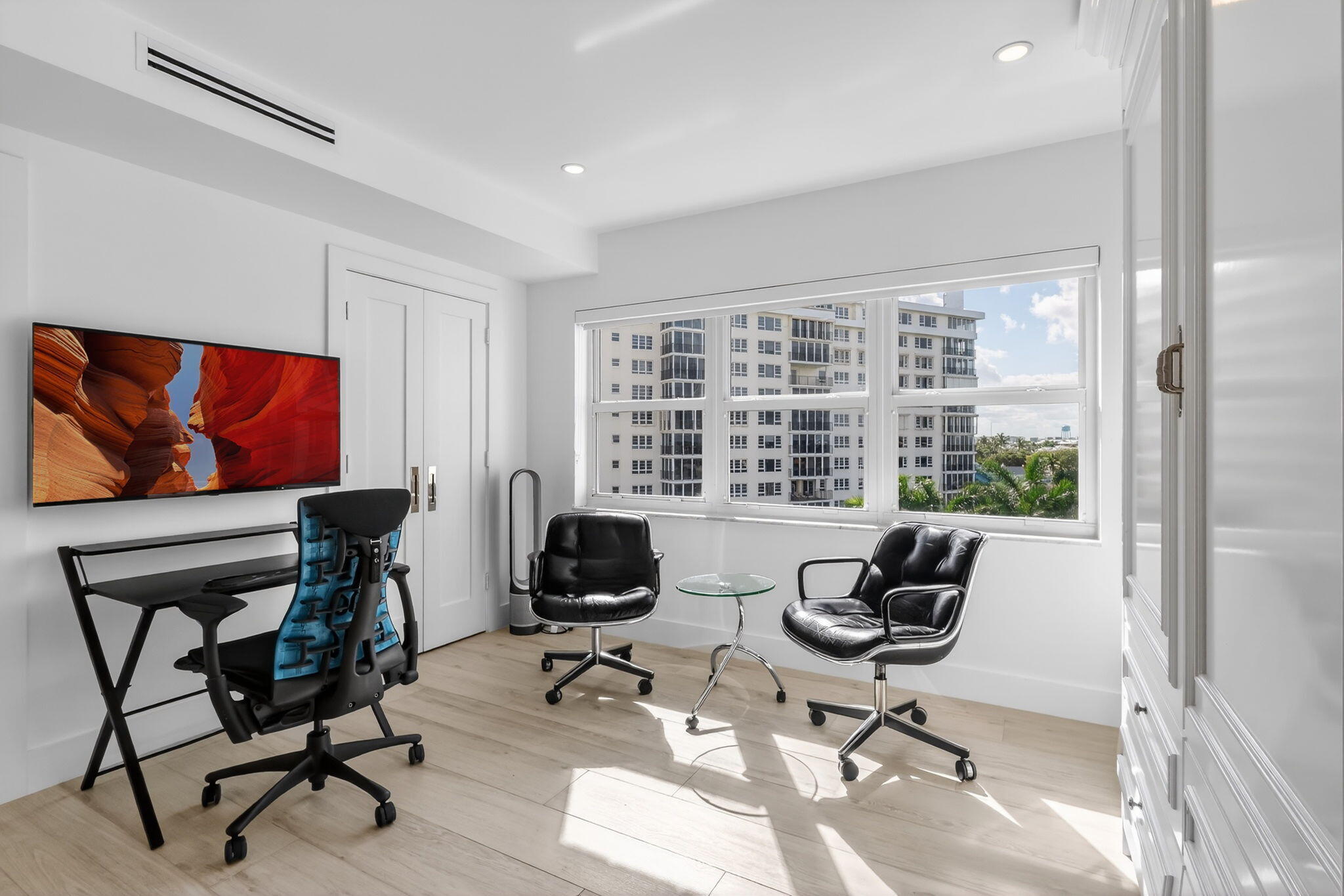 1000 Lowry Street, Unit 6J Delray Beach, FL 33483 - Photo 30 of 63 a living room with furniture and a floor to ceiling window