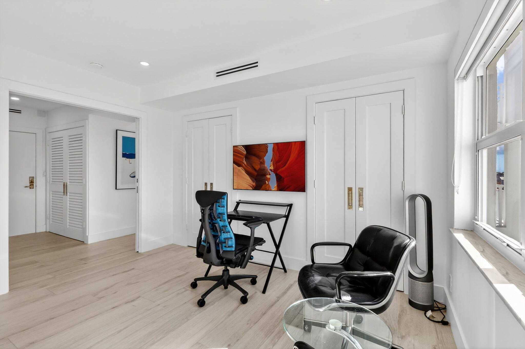 1000 Lowry Street, Unit 6J Delray Beach, FL 33483 - Photo 31 of 63 a view of a workspace with furniture and a window