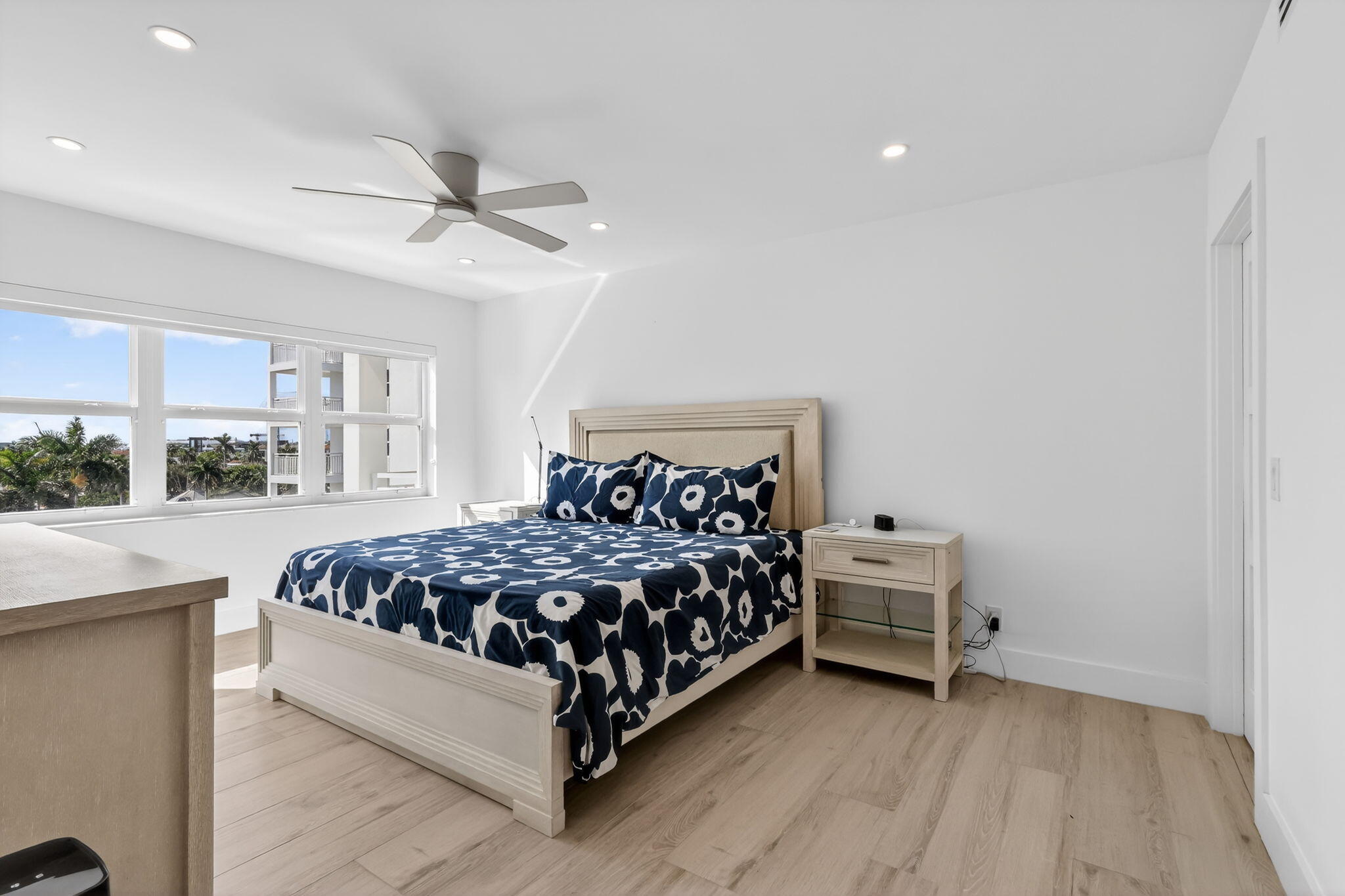 1000 Lowry Street, Unit 6J Delray Beach, FL 33483 - Photo 36 of 63 a bedroom with a bed and a window