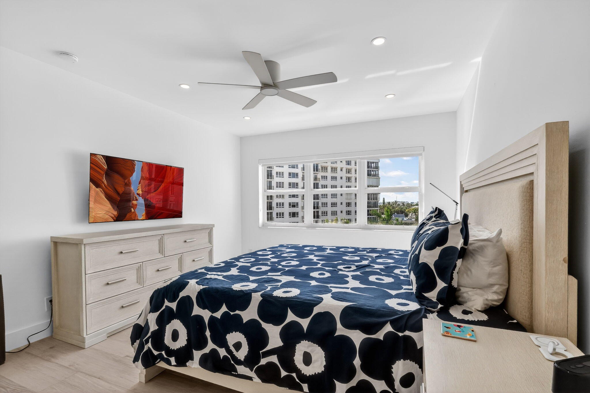 1000 Lowry Street, Unit 6J Delray Beach, FL 33483 - Photo 38 of 63 a bedroom with a bed and a window