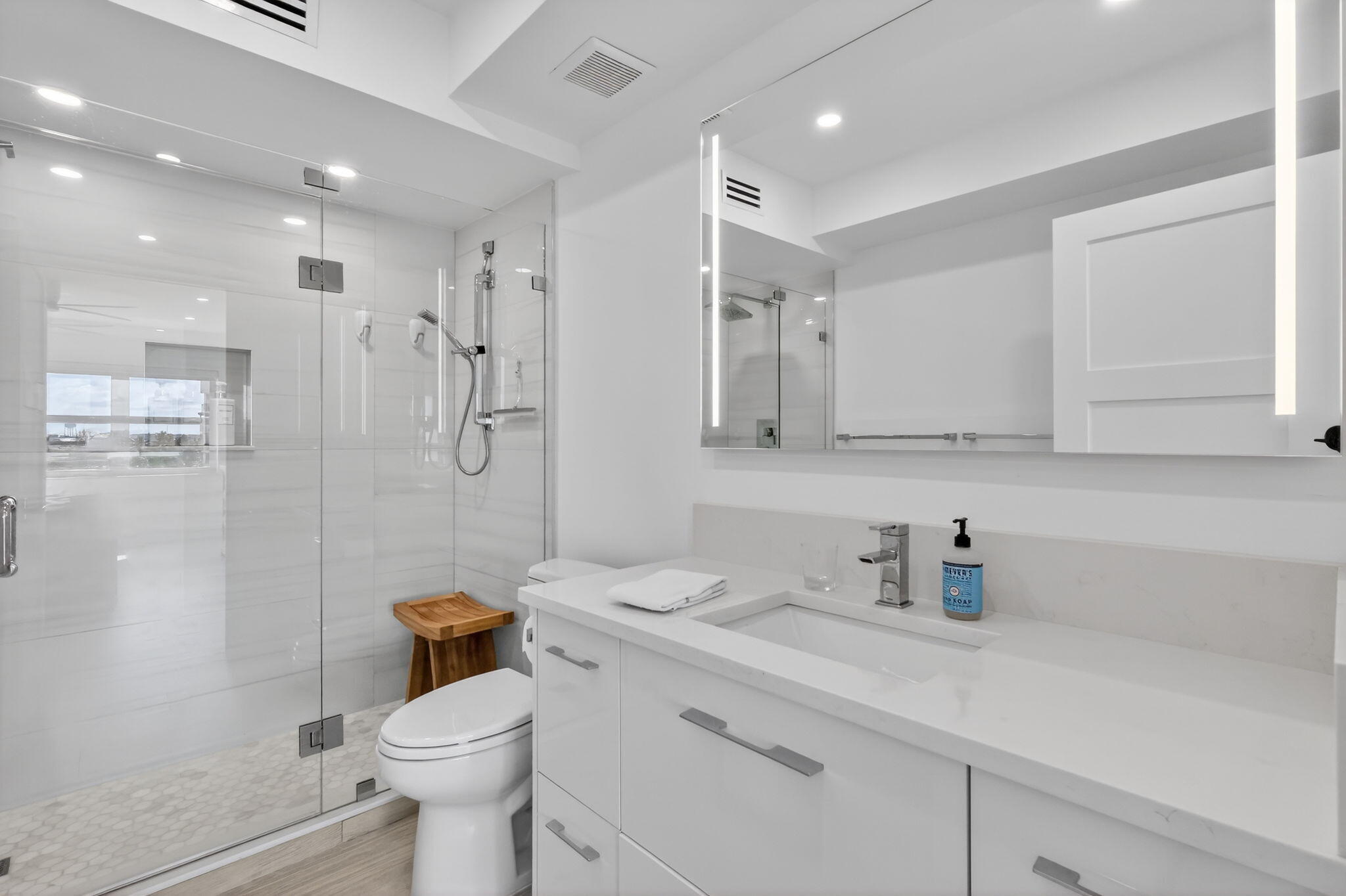 1000 Lowry Street, Unit 6J Delray Beach, FL 33483 - Photo 41 of 63 a bathroom with a sink toilet and shower