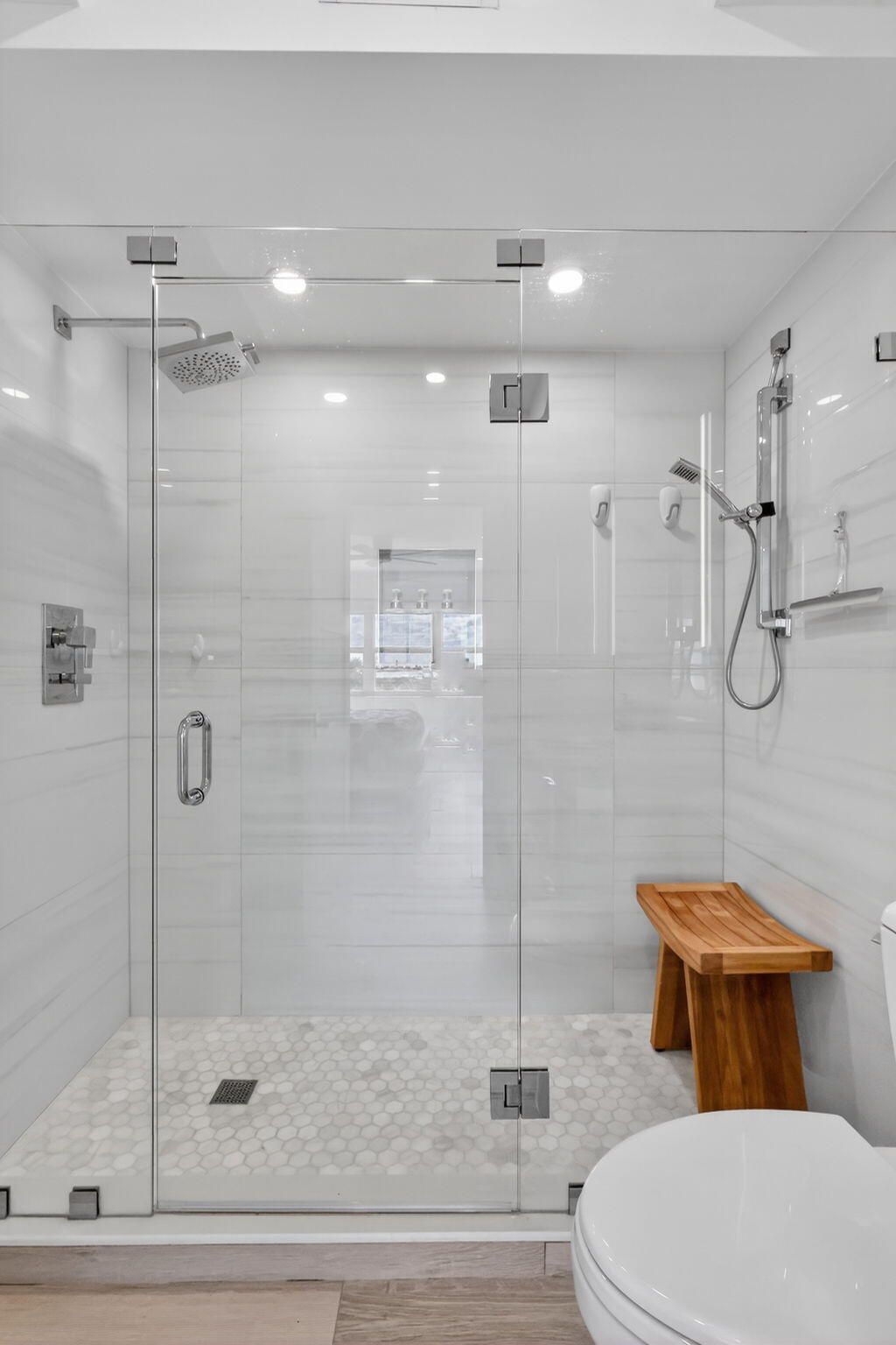 1000 Lowry Street, Unit 6J Delray Beach, FL 33483 - Photo 42 of 63 a bathroom with a toilet and a shower