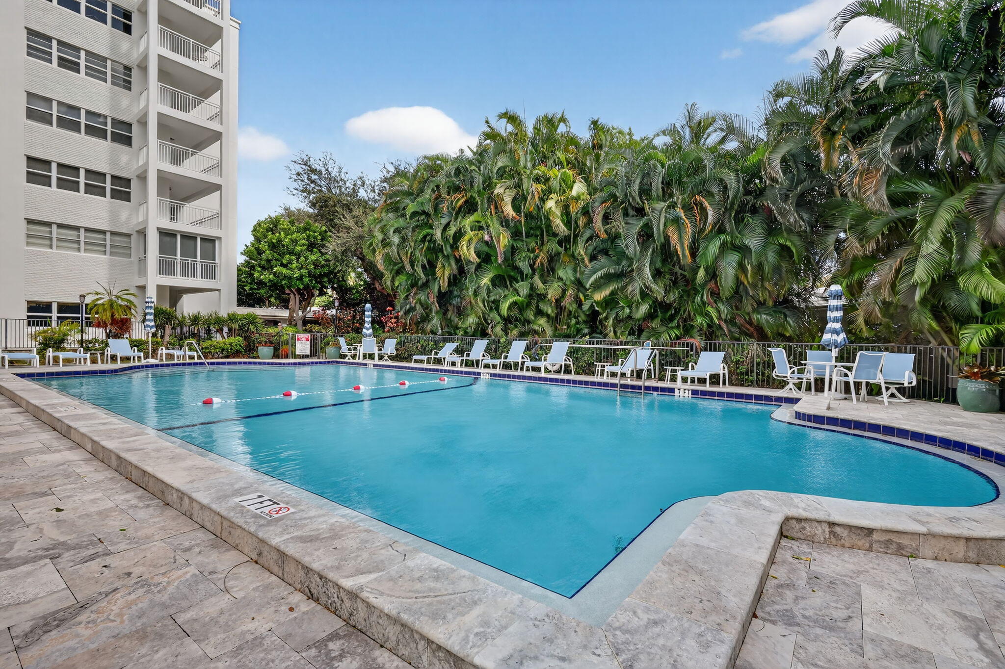 1000 Lowry Street, Unit 6J Delray Beach, FL 33483 - Photo 59 of 63 a view of swimming pool and outdoor space