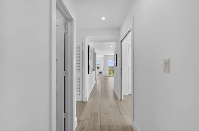 a living room with furniture a dining table and a flat screen tv