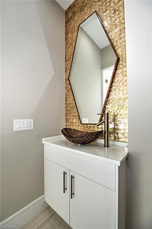 3860 Crayton Road Naples, FL 34103 - Photo 14 of 32 Powder room